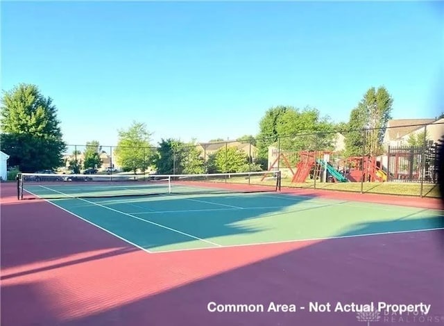 view of sport court featuring community basketball court and fence