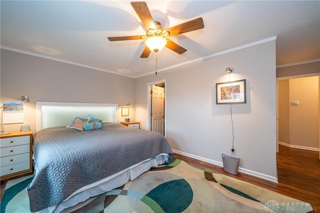 bedroom featuring ceiling fan, ornamental molding, wood finished floors, and baseboards