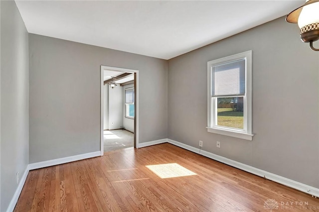 543 W Market St, Germantown, OH 45327 - empty room with wood finished floors and baseboards