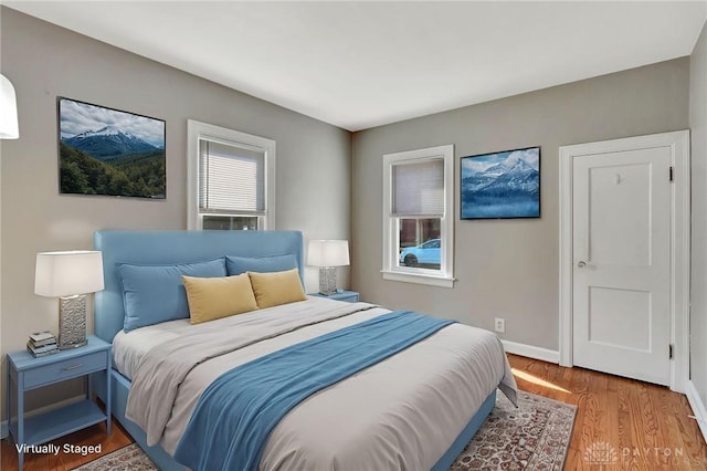 543 W Market St, Germantown, OH 45327 - bedroom with wood finished floors and baseboards
