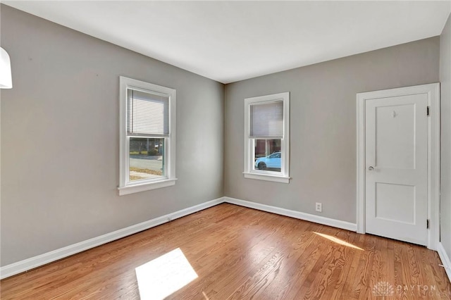 543 W Market St, Germantown, OH 45327 - empty room with wood finished floors and baseboards
