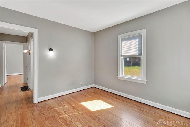 543 W Market St, Germantown, OH 45327 - unfurnished room featuring wood finished floors and baseboards