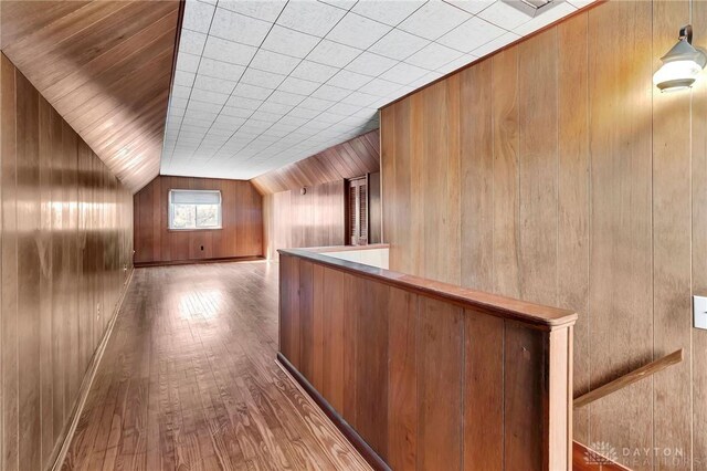 543 W Market St, Germantown, OH 45327 - additional living space with wooden walls, wood finished floors, and vaulted ceiling