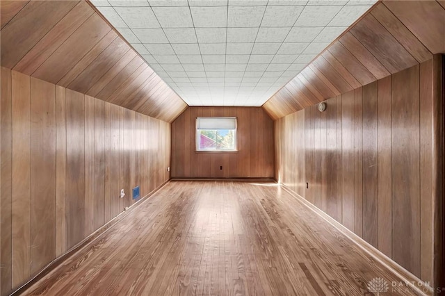 543 W Market St, Germantown, OH 45327 - bonus room featuring hardwood / wood-style floors, wooden walls, and vaulted ceiling