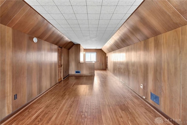 543 W Market St, Germantown, OH 45327 - bonus room featuring wood finished floors, wooden walls, and lofted ceiling