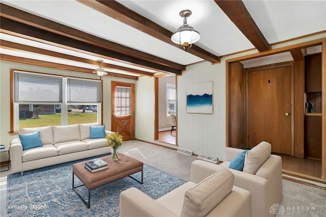 543 W Market St, Germantown, OH 45327 - living area with beamed ceiling, baseboards, and a baseboard heating unit