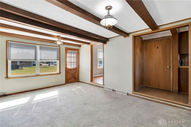 543 W Market St, Germantown, OH 45327 - unfurnished room featuring beamed ceiling, carpet flooring, baseboards, and baseboard heating