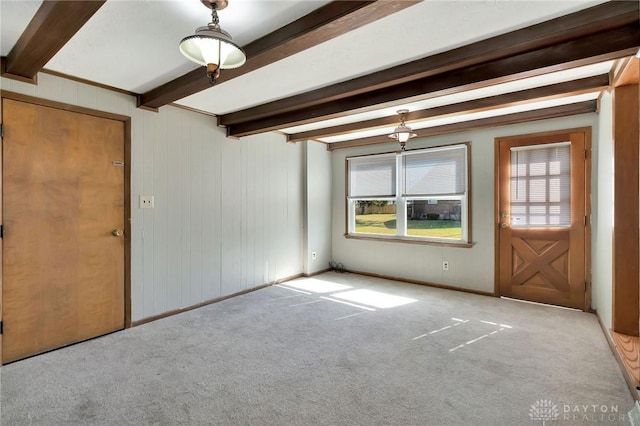 543 W Market St, Germantown, OH 45327 - carpeted foyer with beamed ceiling and plenty of natural light