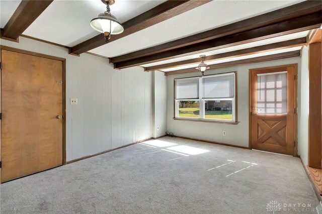 543 W Market St, Germantown, OH 45327 - carpeted foyer with beamed ceiling and plenty of natural light