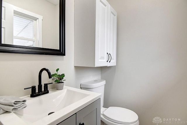 half bath with toilet and vanity