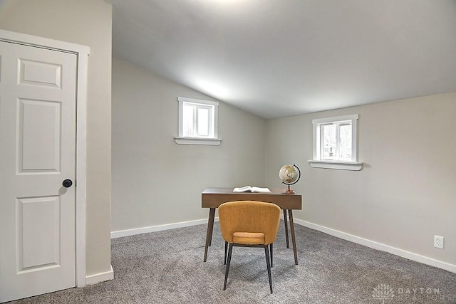 home office with carpet floors, baseboards, and vaulted ceiling