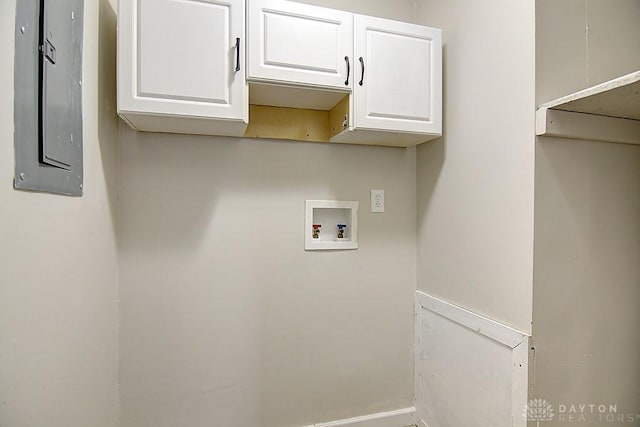 laundry room featuring electric panel, cabinet space, and hookup for a washing machine