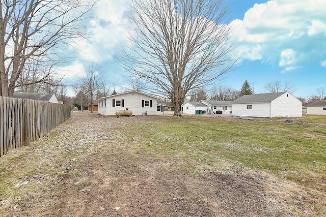 view of yard with fence