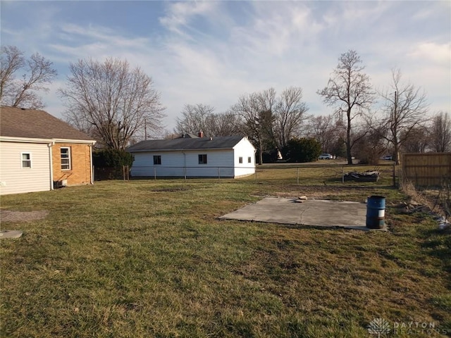 view of yard with a patio and fence
