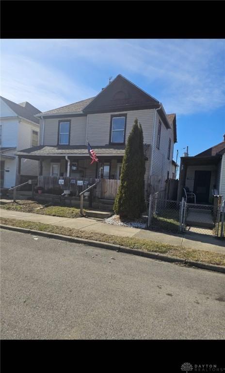 217 Mabel Ave Unit 215, Dayton, OH 45403 - view of front facade featuring covered porch