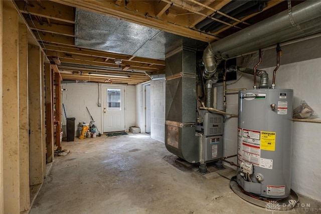 unfinished below grade area featuring water heater and heating unit