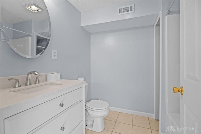 full bathroom featuring visible vents, toilet, vanity, tile patterned flooring, and walk in shower