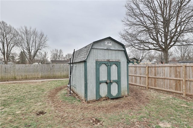 view of shed featuring a fenced backyard