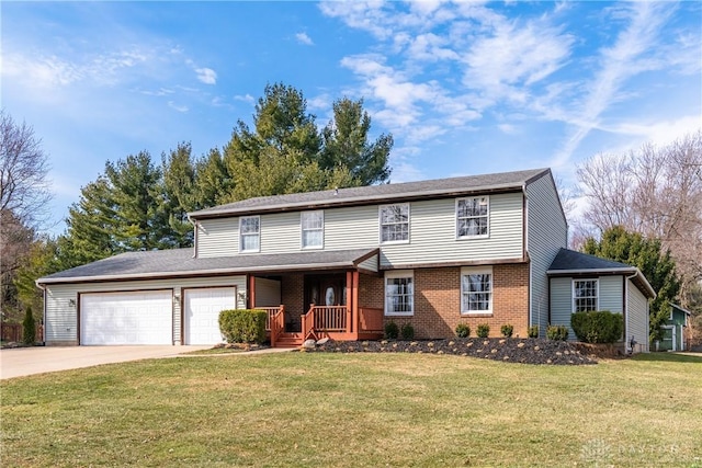 view of front of property featuring a garage, a front lawn, concrete driveway, and brick siding