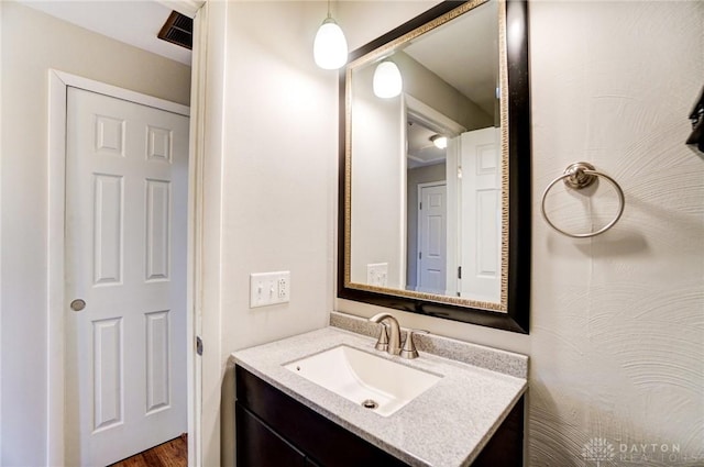 bathroom featuring visible vents and vanity