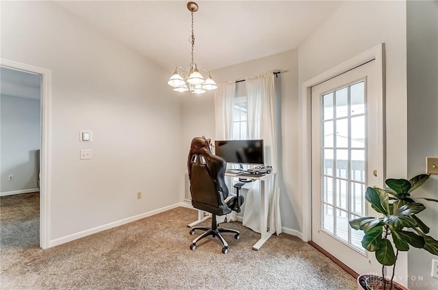 carpeted office featuring a chandelier and baseboards