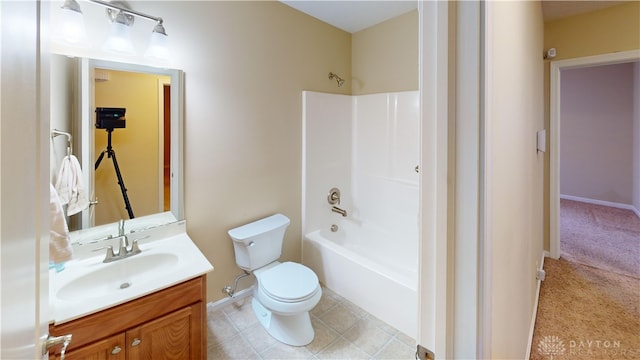 bathroom featuring shower / tub combination, tile patterned flooring, toilet, vanity, and baseboards