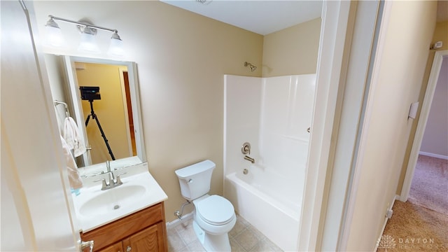 full bathroom featuring baseboards, vanity, toilet, and bathing tub / shower combination