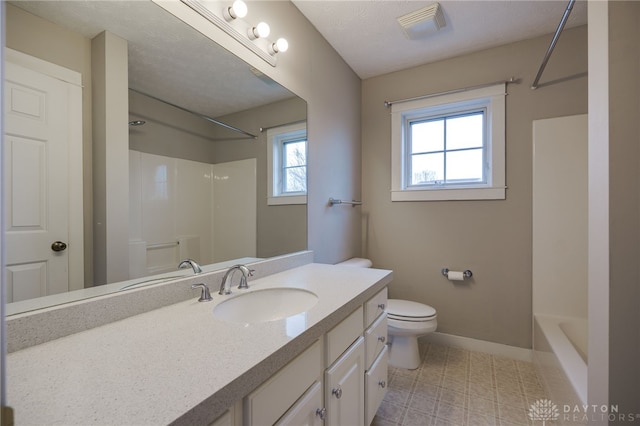 bathroom with visible vents, baseboards, toilet, vanity, and shower / bathtub combination