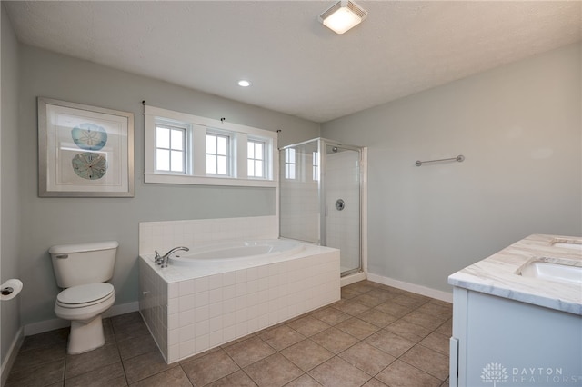 bathroom with toilet, a garden tub, tile patterned flooring, a shower stall, and a sink