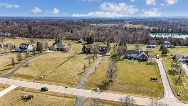 aerial view with a wooded view