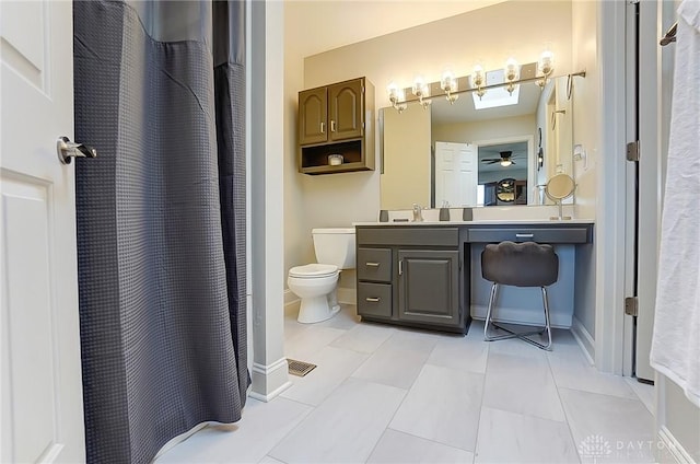 full bathroom featuring baseboards, a ceiling fan, toilet, tile patterned flooring, and vanity