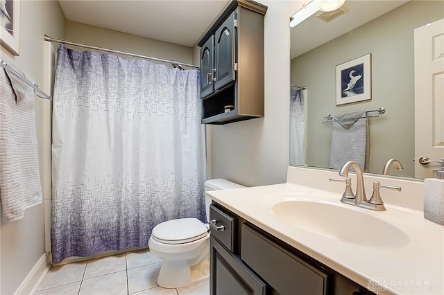 bathroom with visible vents, toilet, a shower with curtain, tile patterned floors, and vanity