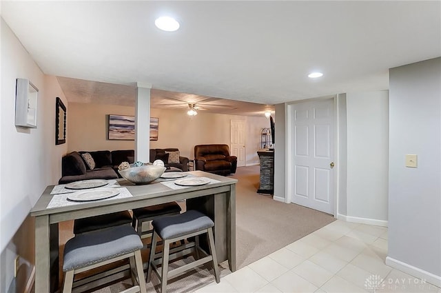 dining space featuring baseboards, light colored carpet, a ceiling fan, and recessed lighting