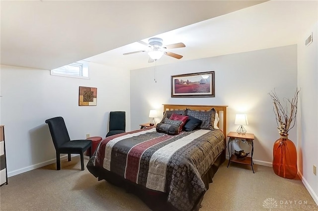 bedroom featuring carpet flooring, ceiling fan, visible vents, and baseboards