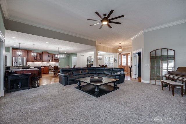 living room featuring recessed lighting, light carpet, crown molding, and baseboards