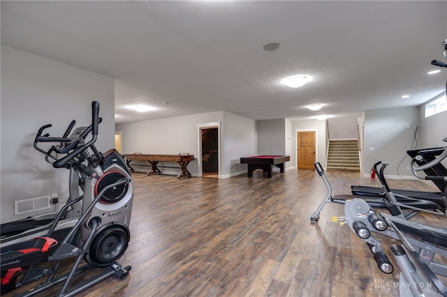 workout area featuring pool table, visible vents, baseboards, and wood finished floors