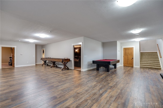 playroom with dark wood finished floors, billiards, a textured ceiling, and baseboards