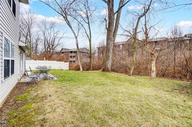 view of yard featuring a patio area and fence