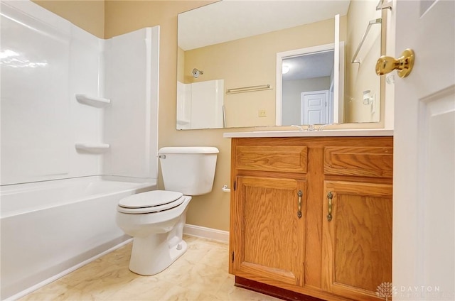 bathroom with vanity, shower / tub combination, toilet, and baseboards