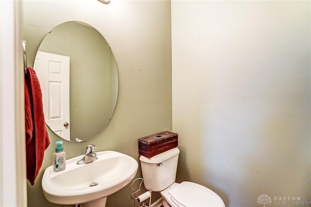 bathroom with a sink and toilet