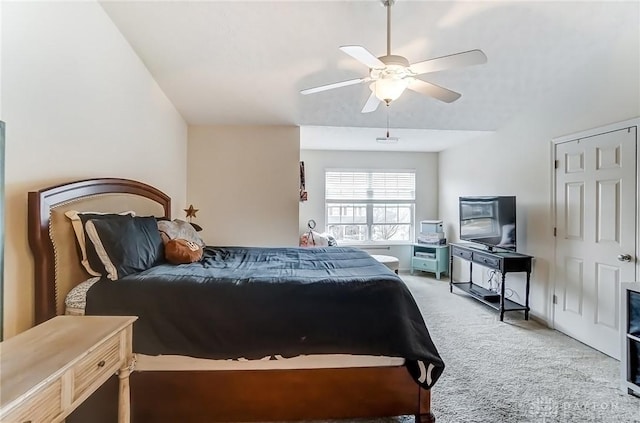 carpeted bedroom featuring a ceiling fan