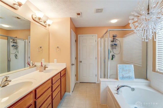 full bathroom with a garden tub, a sink, visible vents, and a shower stall