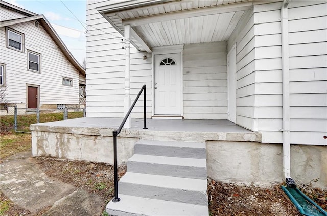 property entrance featuring fence