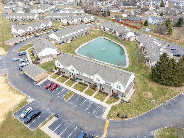 aerial view featuring a water view and a residential view