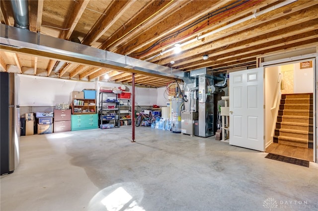 unfinished below grade area with heating unit, water heater, and stairway