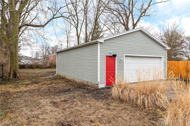 detached garage with fence