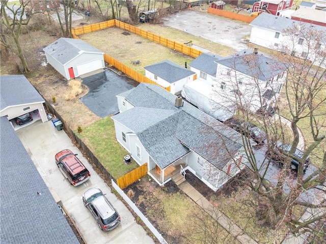 birds eye view of property with a residential view