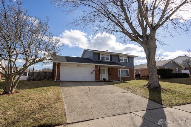 traditional-style house with an attached garage, driveway, a front lawn, and brick siding