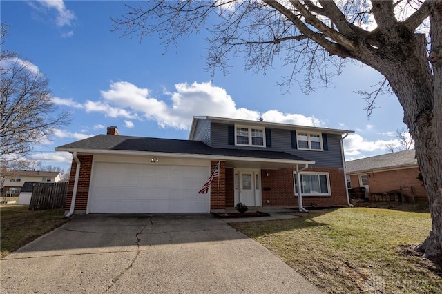 traditional-style home with a garage, brick siding, driveway, and a front lawn