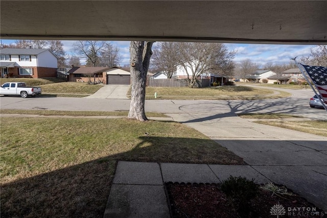 view of yard featuring a residential view